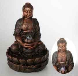 Foto Buda fuente de interior con bola de luz