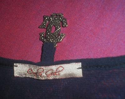 Foto logo metal circonitas camiseta marca carla goli con estampado save the marinero