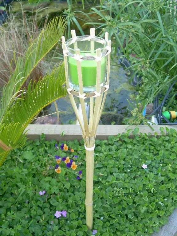 Foto 


Antorcha de bambu con vela de color verde (3 unidades)

