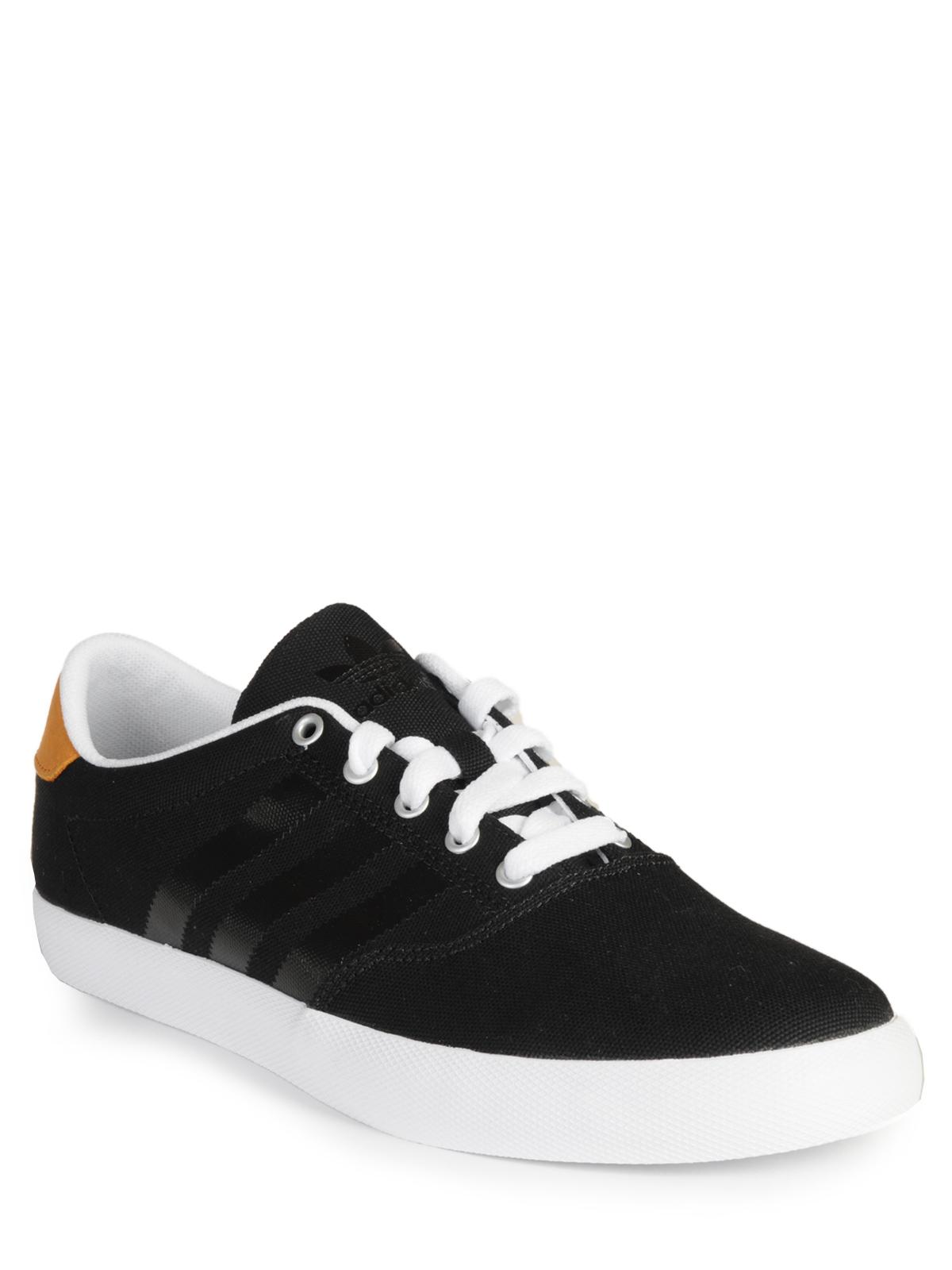 Foto Adidas Adi M.C. Low Zapatillas negro/negro/blanco EU: 45