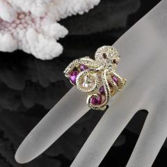 Foto anillo metal circonita perla diseño pulpo color dorado