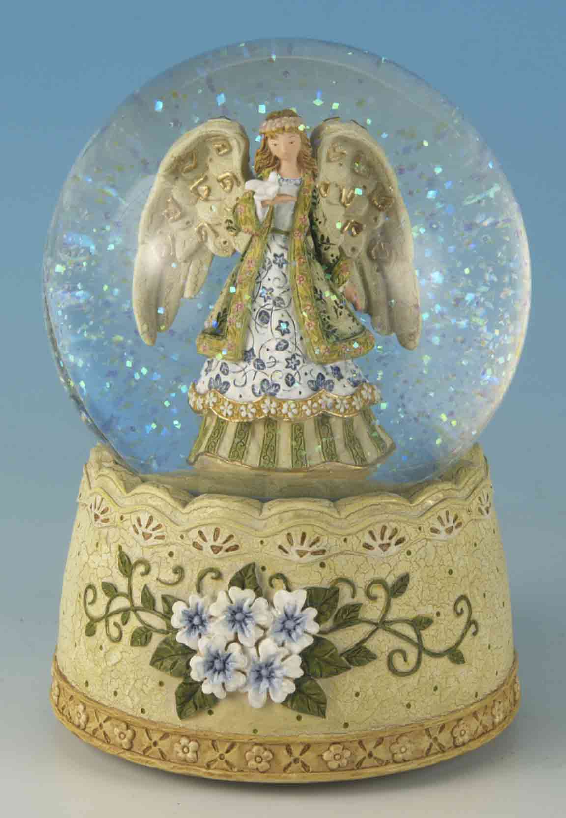 Foto Bola de cristal ángel con paloma