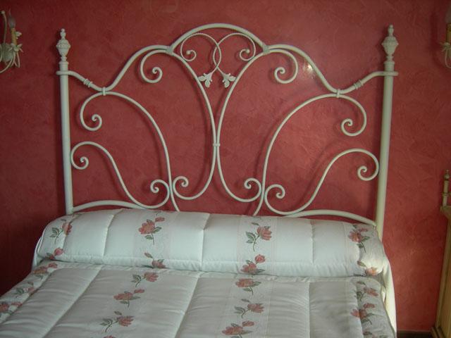 Foto Cabecero de forja decoración marfil