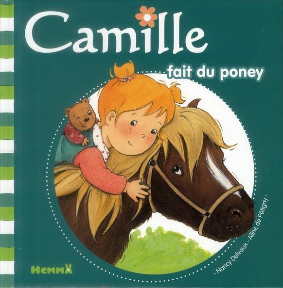 Foto Camille fait du poney
