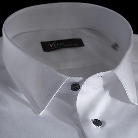 Foto Camisa color liso blanco algodón sarga, cuello estilo italiano bajo de puntas cortas, puño limado
