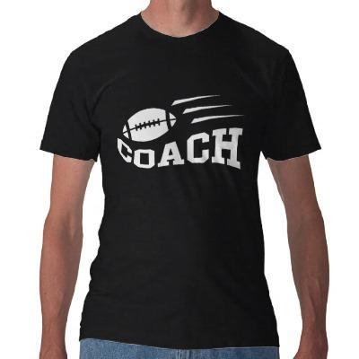 Foto Camiseta del entrenador de fútbol con la bola que