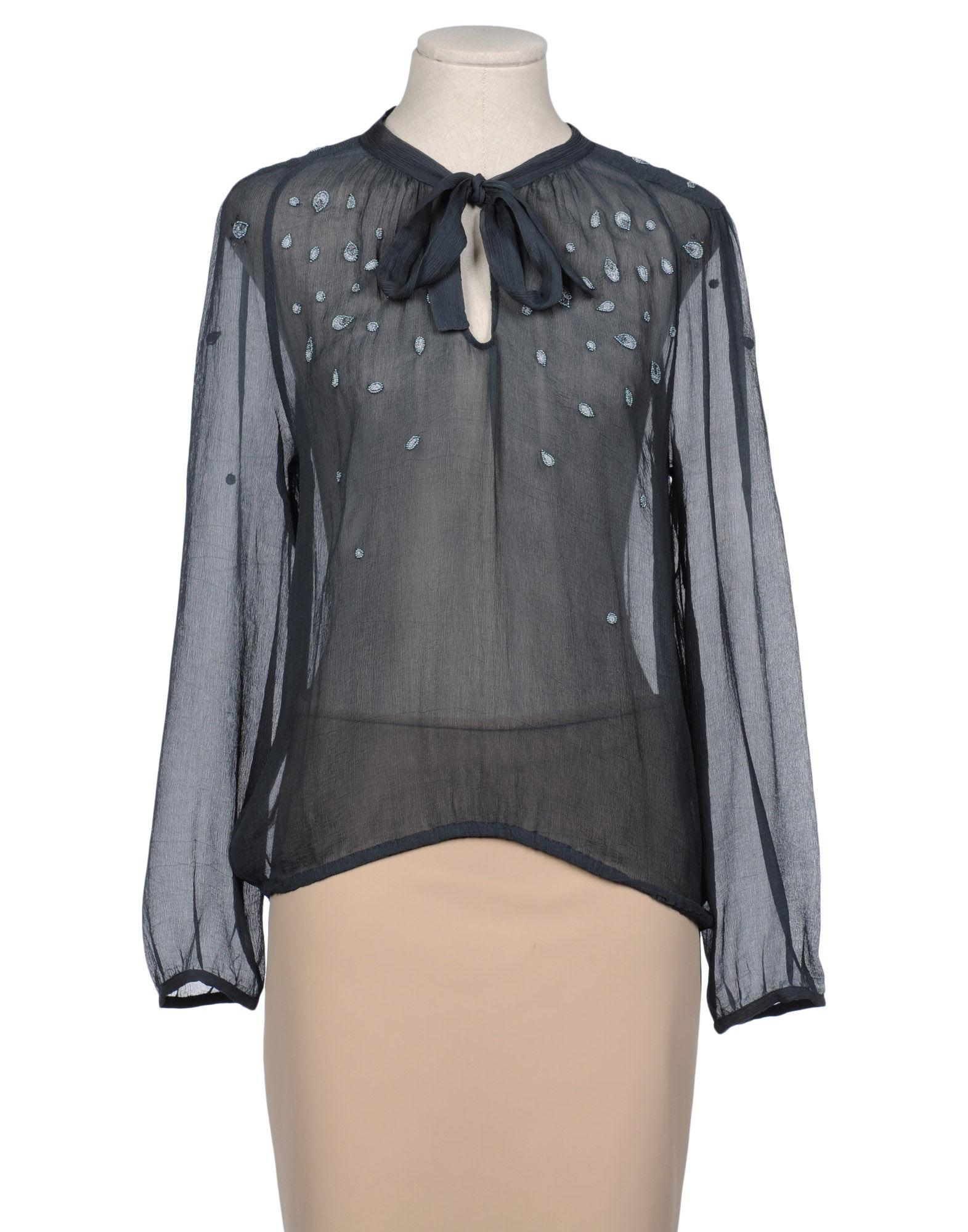 Foto chemins blancs blusas
