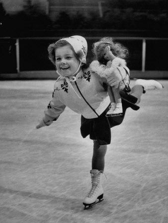 Foto Child Skater Helen Ann Rousselle Holding Doll While Skating across the Ice - Laminas