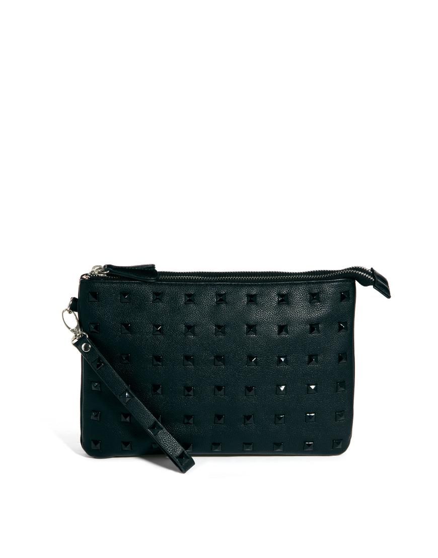 Foto Clutch con tachuelas y doble cremallera superior de Faith Negro