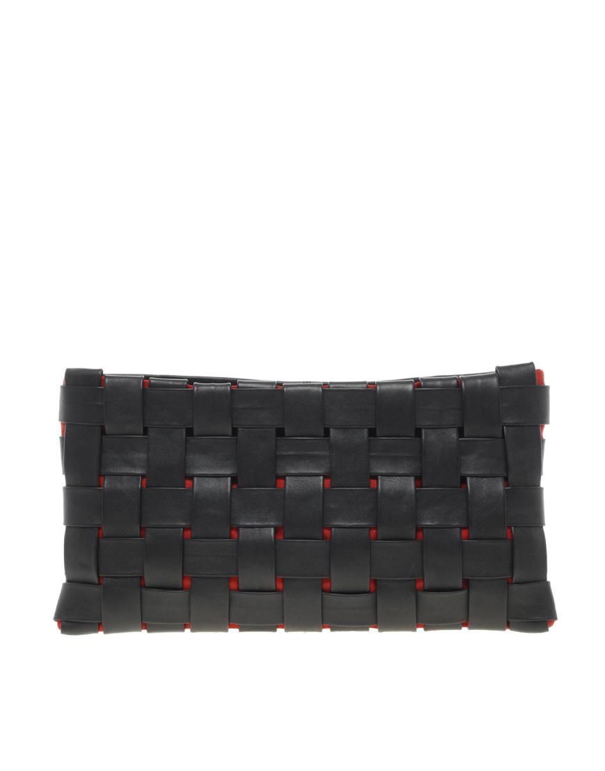 Foto Clutch de cuero con diseño trenzado en contraste de ASOS Negro