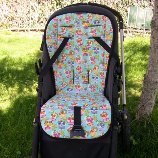 Foto Colchoneta silla bebe con calaveras turquesa