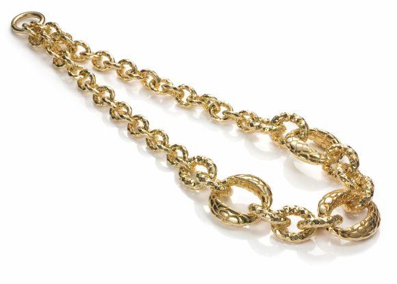 Foto Collar piel de reptil dorado