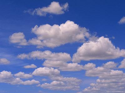 Foto Cumulus Clouds Above the Masai Mara National Reserve, John Eastcott & Yva Momatiuk - Laminas