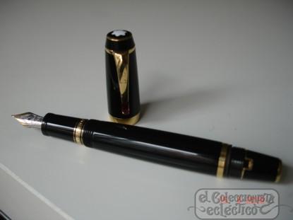 Foto estilográfica montblanc bohéme. resina negra y oro. plumín 14k
