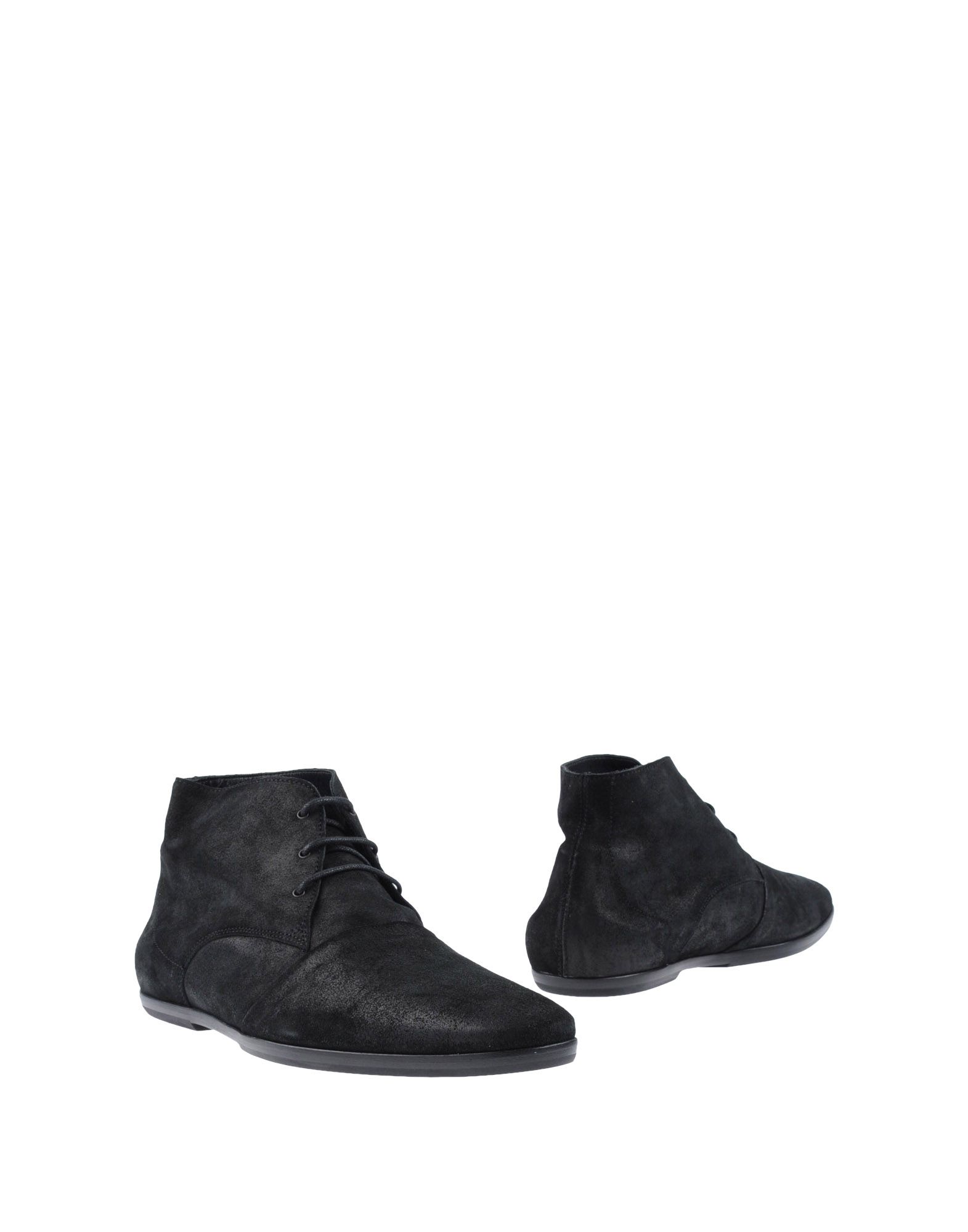 Foto fessura botines cordones
