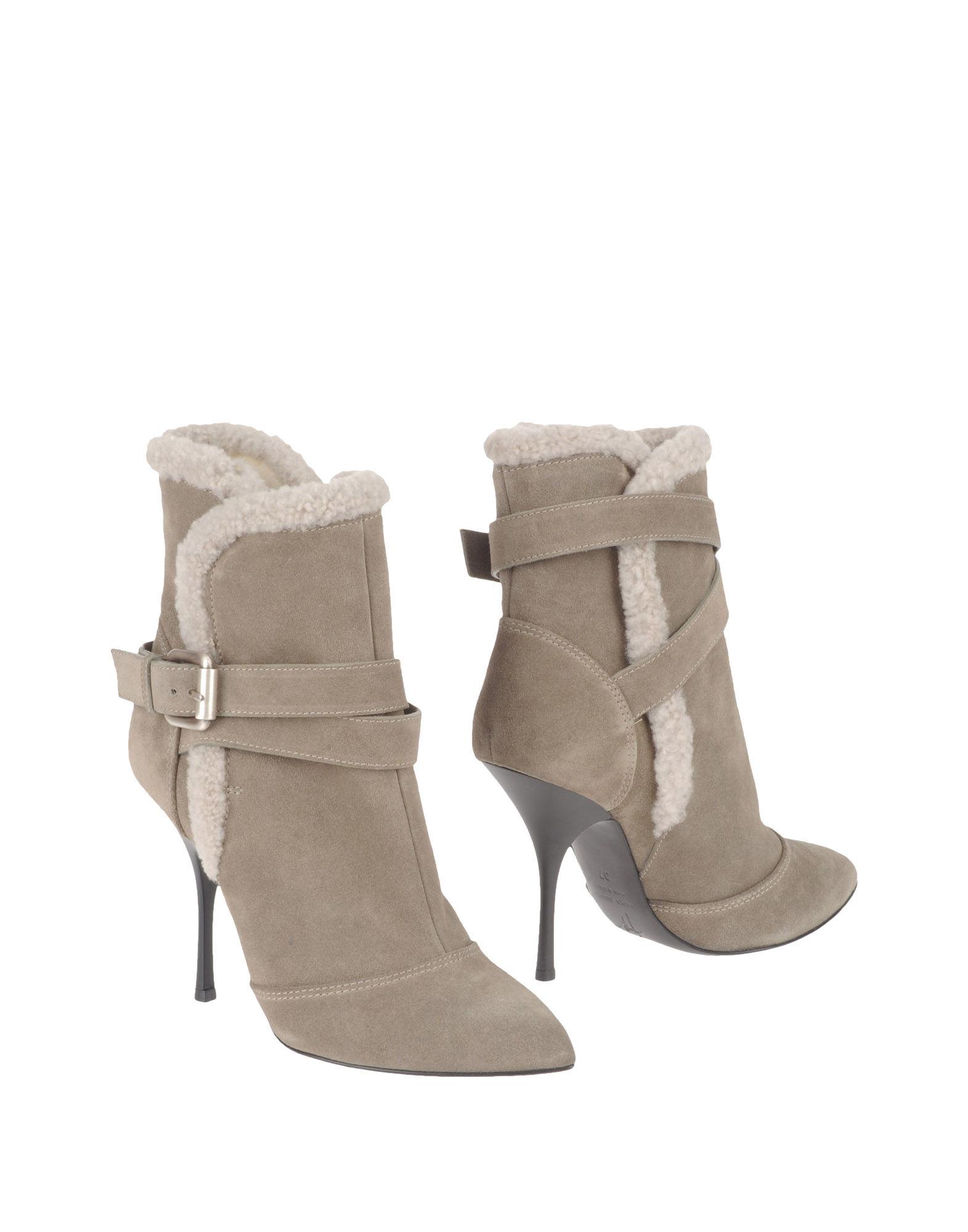Foto giuseppe zanotti design botines de caña alta
