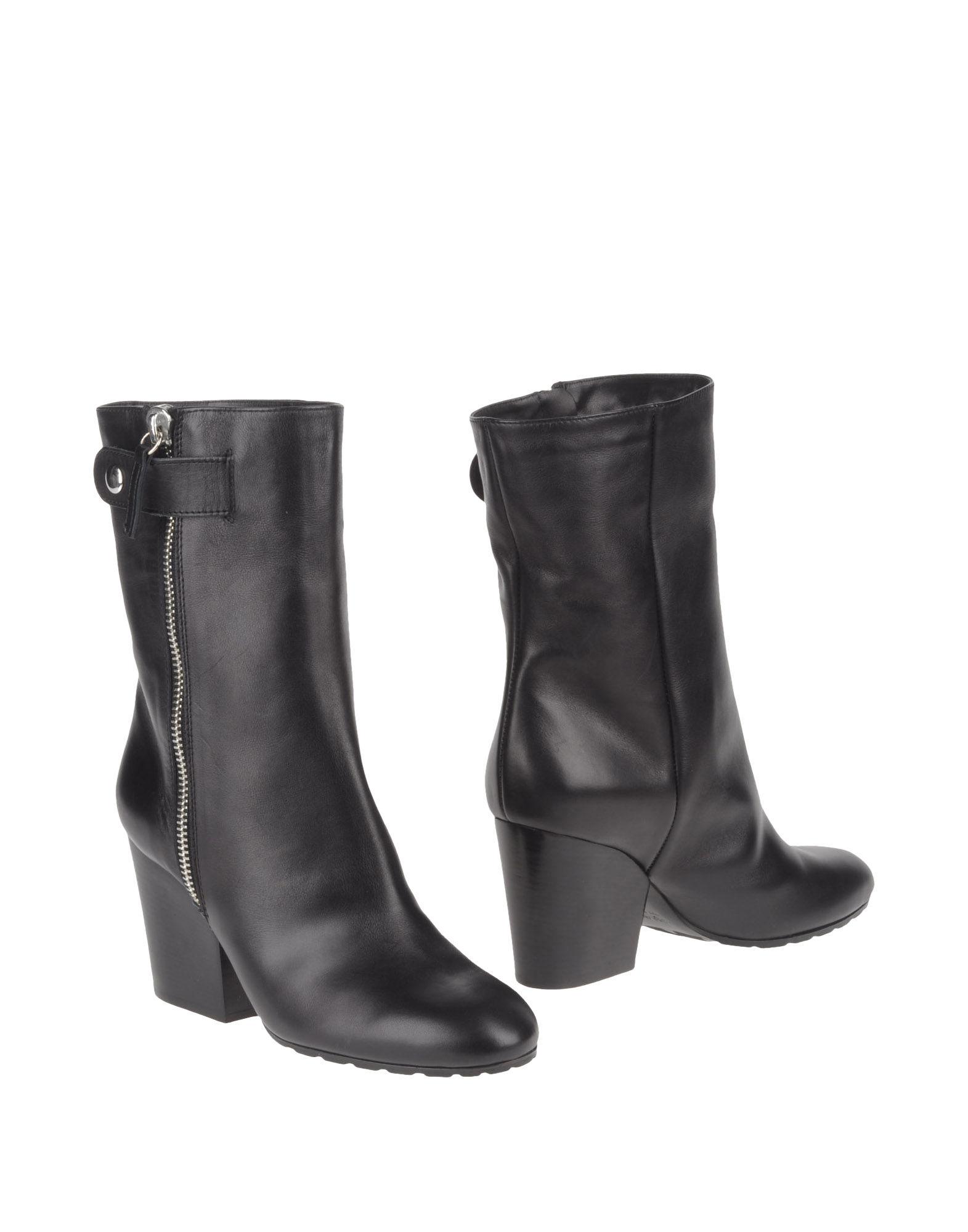 Foto giuseppe zanotti design botines de caña alta
