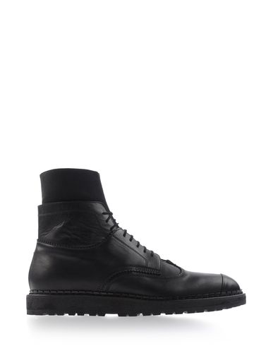 Foto kris van assche botines de caña alta
