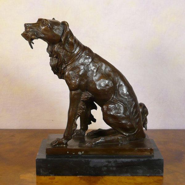 Foto La caza spaniel - estatua de bronce
