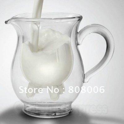 Foto la mini ubre del hogar de la leche pinta creativa de la taza de la media formó el jnc- de la desnatadora