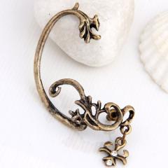 Foto metal twine dragon earring
