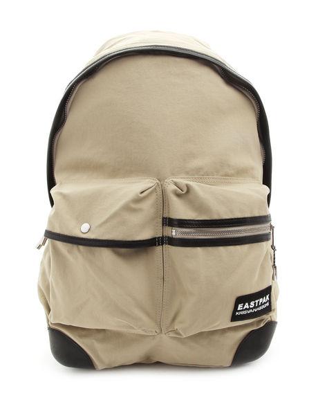 Foto Mochila beige con detalles negros