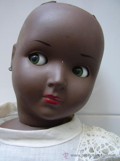 Foto muñeca negra o negrita con marca y ojos basculantes plástico duro