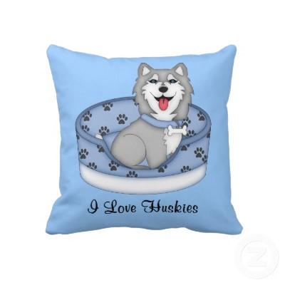Foto Perro esquimal gris y blanco en la cama (muchacho) Cojin