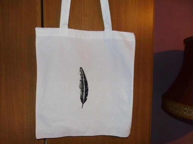 Foto pjaro pluma bolso bolsa