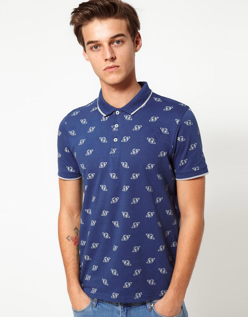 Foto Polo con estampado de mundo de ASOS Azul