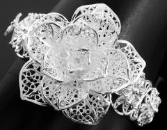 Foto pulsera bañado de plata flor rosa