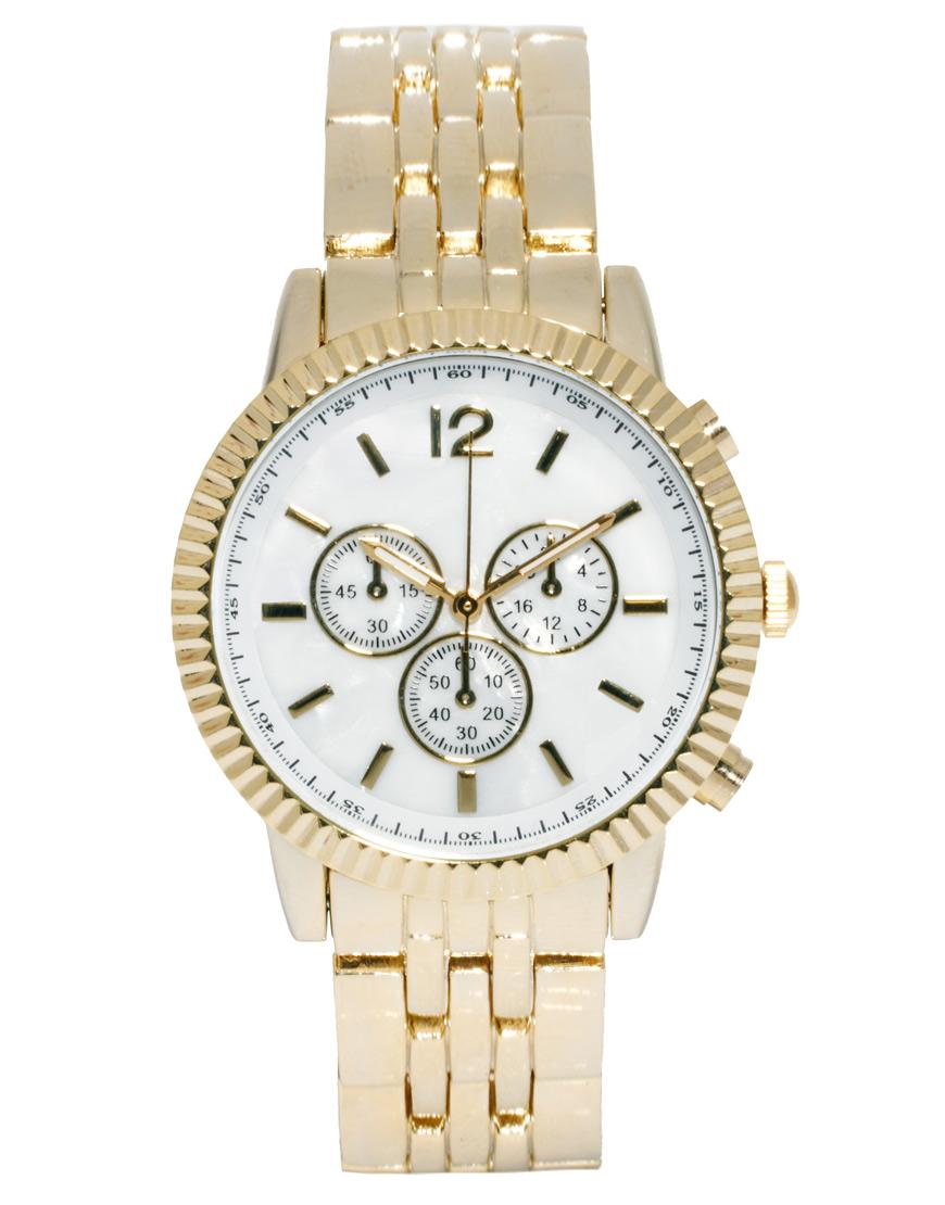 Foto Reloj con bisel intercambiable y esfera MOP de ASOS Crema