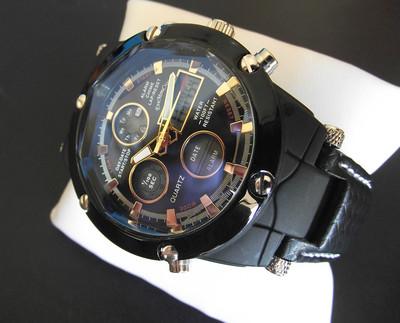 Foto reloj digital y analogico de hombre.marca evemoncrois negro con oro.correa piel