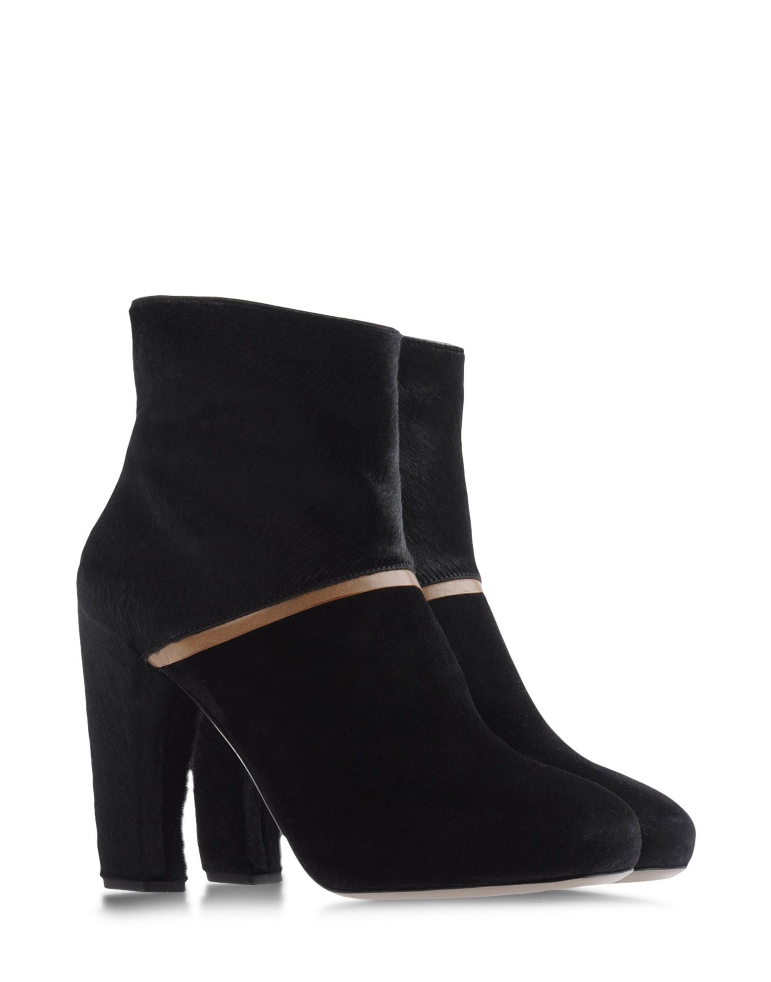 Foto roberto del carlo botines de caña alta
