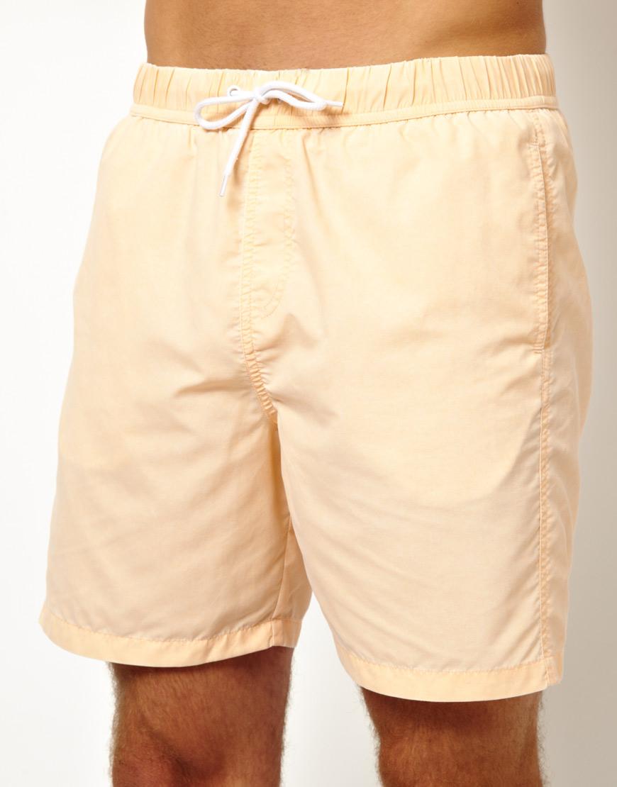Foto Shorts de baño con lavado ácido de ASOS Melocotón