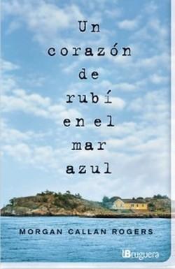 Foto Un corazón de rubí en el mar azul