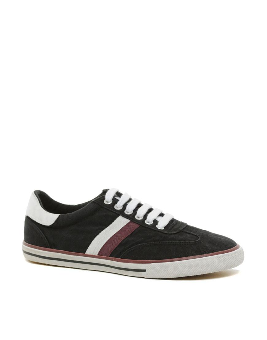 Foto Zapatillas de deporte retro descoloridas de ASOS Negro