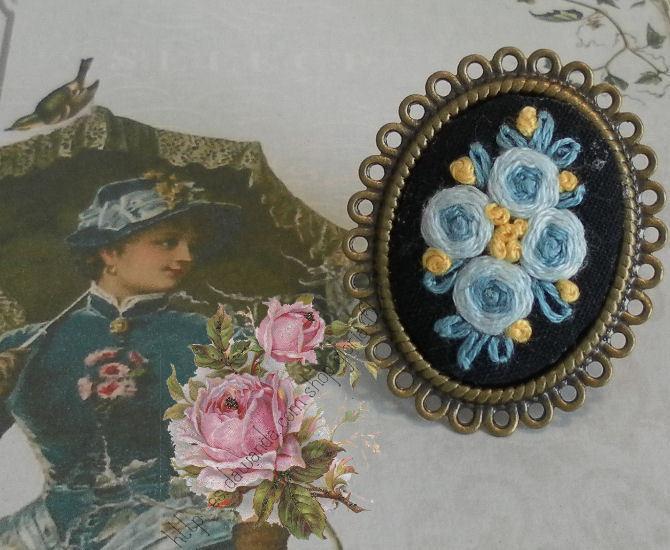 Foto anillo en oro viejo con bouquet bordado sobrenegro