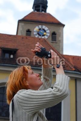 Foto Cuadro con foto profesional: woman take a picture against the tower background, del autor Igor Stepovik en DecoMinio de 150 x 50 cm foto 679572