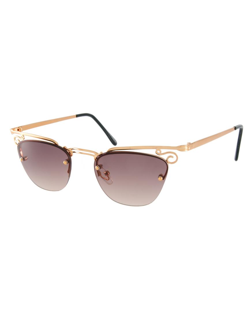 Foto Gafas de sol con diseño en forma de ojos de gato y detalle de fili... foto 674959