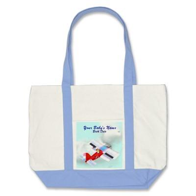 Foto La bolsa de asas del avión de la cigüeña del bebé foto 121691