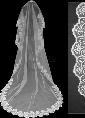 Foto Magnífico hilo marfil largo velo nupcial de la boda