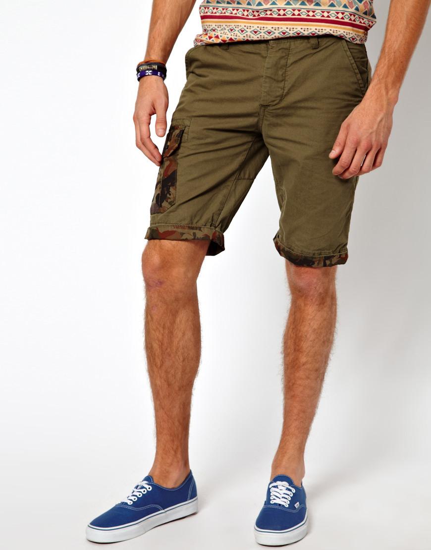 Foto Pantalones cortos cargo con bolsillo de camuflaje de Primark Caqui