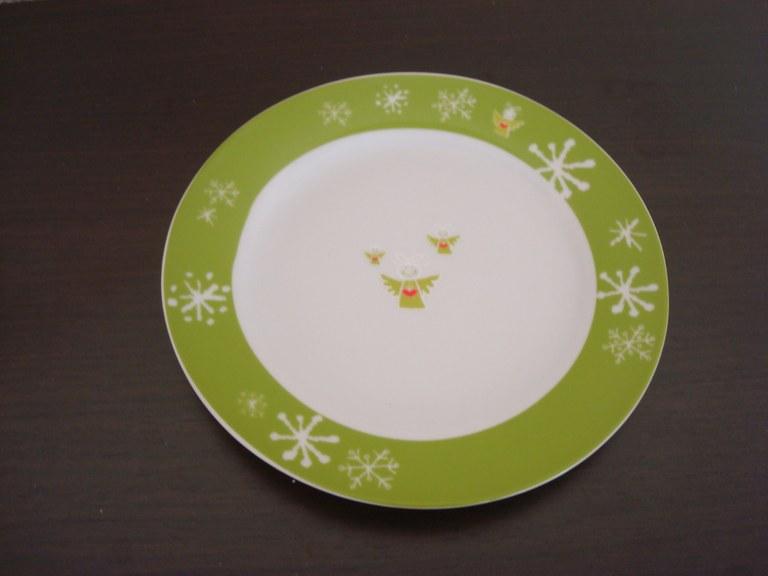 Foto Plato verde con ángeles y estrellas