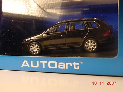 Foto Precioso Volkswagen Golf V Ranchera. Auto Art 1:43. foto 193619