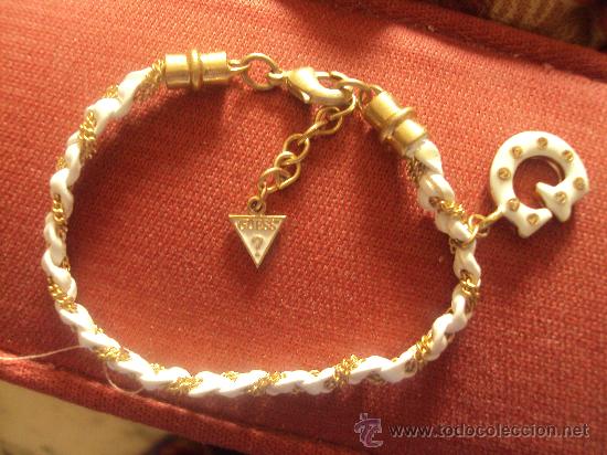 Foto pulsera de la marca guess restos de tienda foto 47455