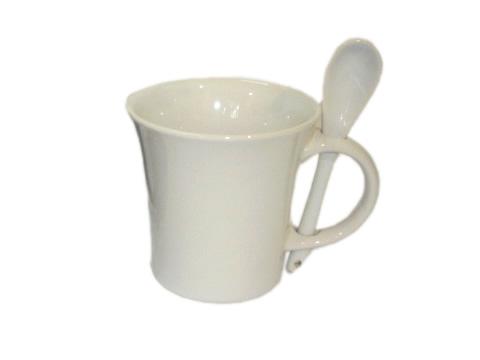 Foto Taza blanca con cuchara